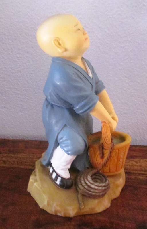 Vintage Shaolin Baby Monk Resin Figurene carring a bucket. Very Collectable. 140x100mm