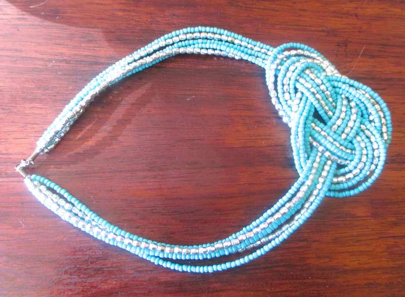 Vintage Necklace Turquoise Blue & Silver colour Seed Beads Knot, Striking item.