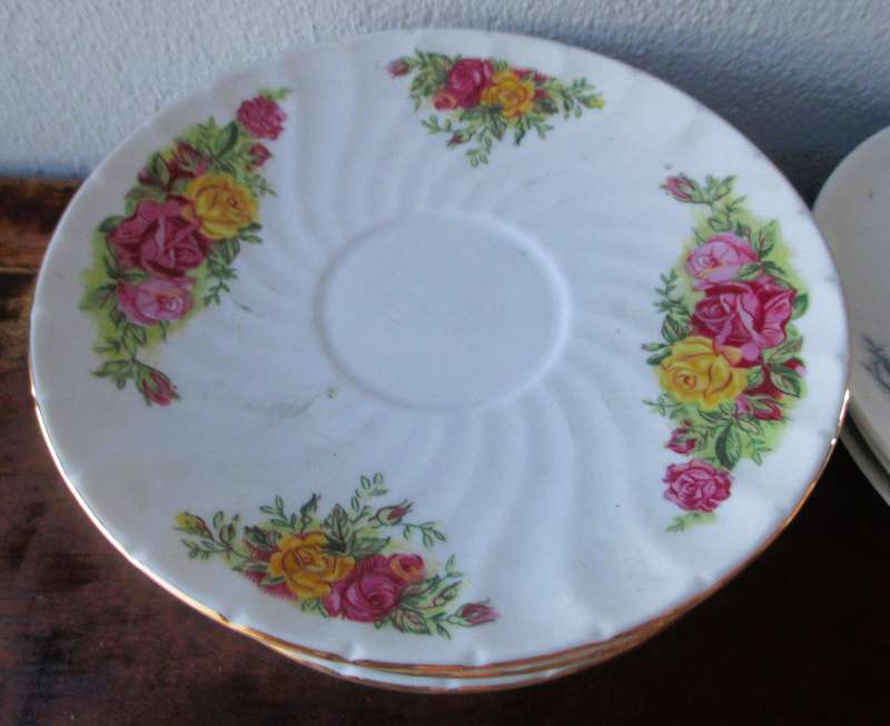 Lot of 7 Vintage Porcelain saucers. Thomas Germny and China rose graden.