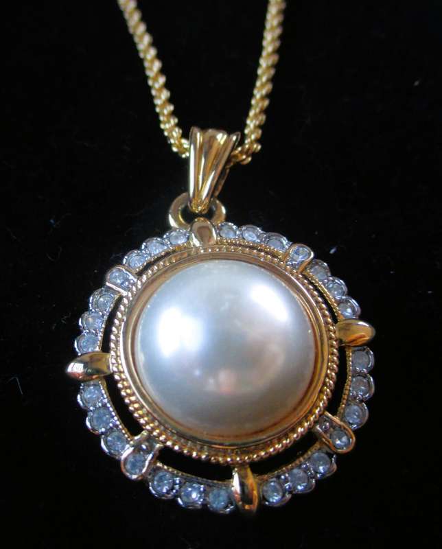 Vintage Costume Faux Pearl and Rhinestone Necklace and clip on earing set.