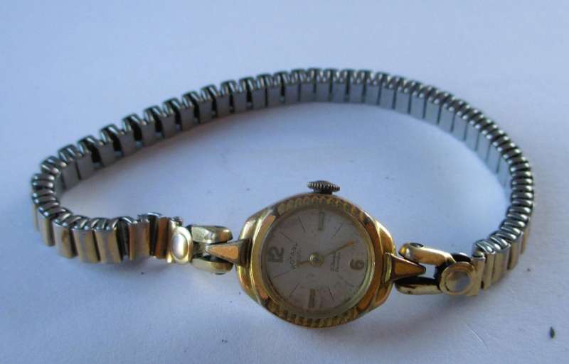 Vintage Lady gold color. Rotary watch. original strap. Working.