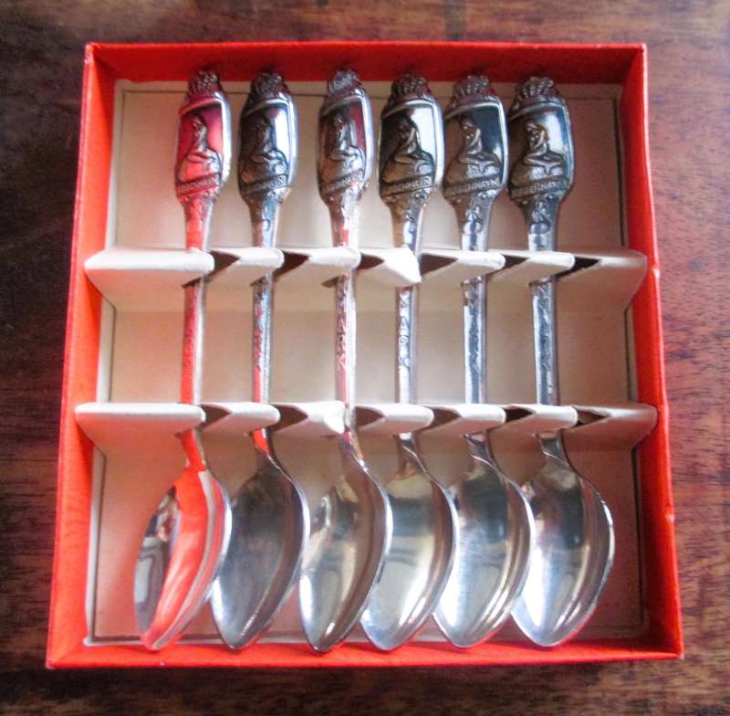6 small Greetings from Denmark Silverplate Spoons in box.