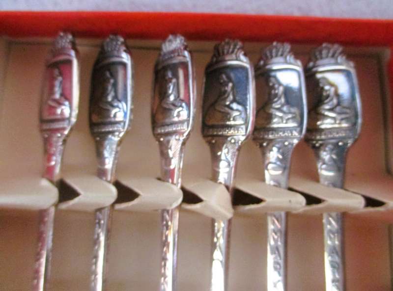 6 small Greetings from Denmark Silverplate Spoons in box.
