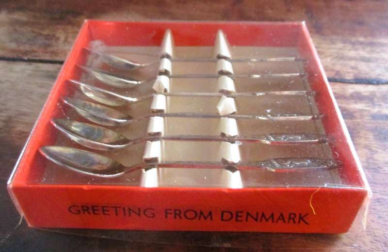 6 small Greetings from Denmark Silverplate Spoons in box.