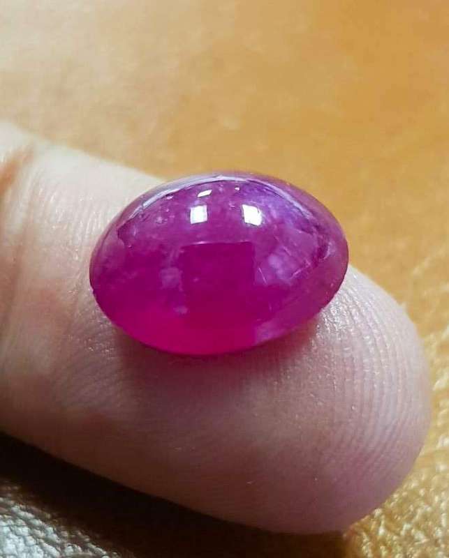 10.57Ct. Ruby Oval  Cabochon Pinkish Red Color