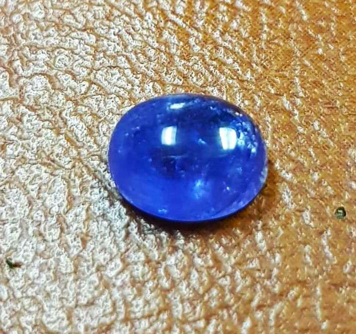 2.77Cts Tanzanite Purplish Blue  Oval Cabochon 7x9MM. Ravishing Colour & Full Fire!