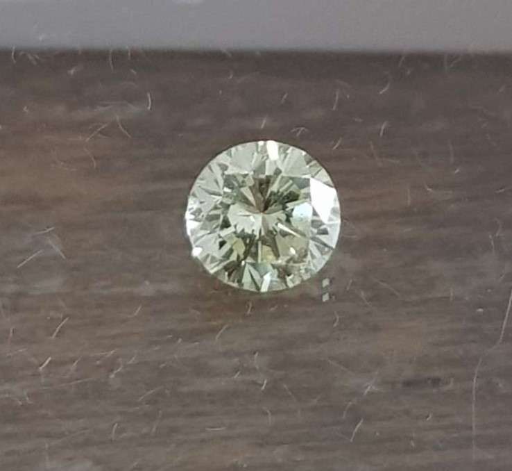 0.52cts Diamond Round Cut VS1 / Fancy Yellow**Certified**