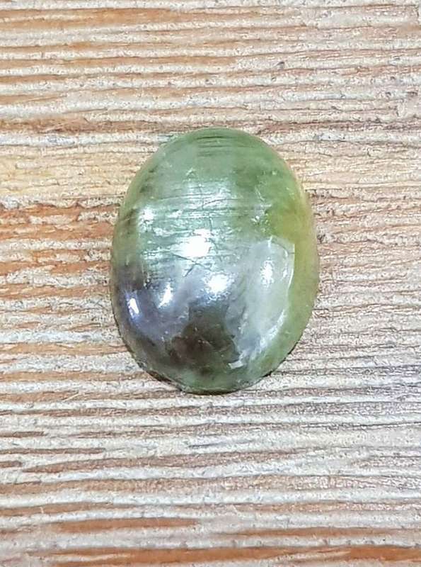 17.54Ct. Sapphire Star 6 Rays Oval Cabochon Golden Green  Good! Sparkling! Madagascar