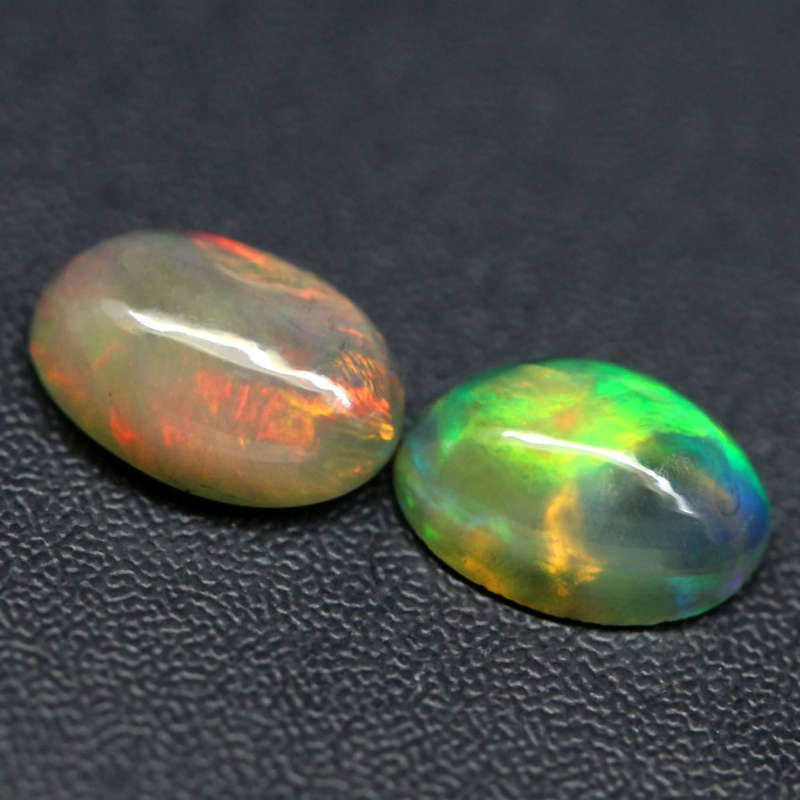 1.12Ct.  Opal Oval Cabochon Multi Colors Glittering Rainbow 3D Ethiopian Gemstone