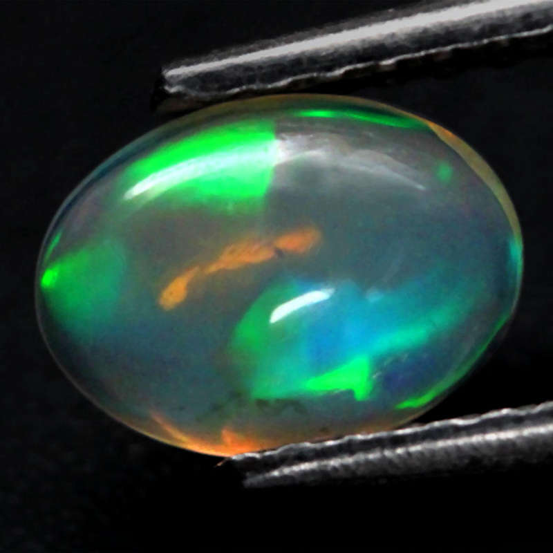 0.42Ct. Opal Oval Cabochon Multi Colours Glittering Rainbow 3D! Ethiopian Natural