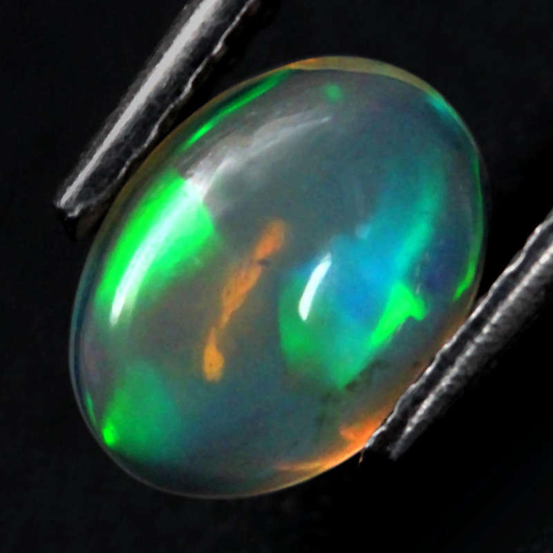 0.42Ct. Opal Oval Cabochon Multi Colours Glittering Rainbow 3D! Ethiopian Natural