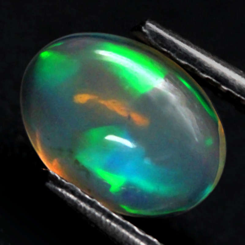 0.42Ct. Opal Oval Cabochon Multi Colours Glittering Rainbow 3D! Ethiopian Natural