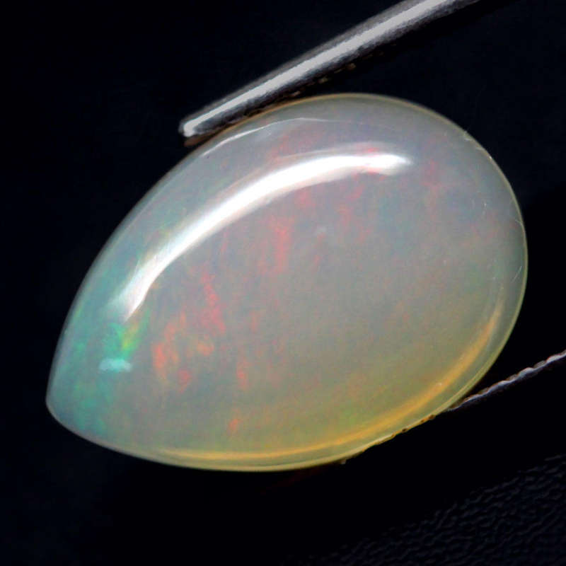 2.06Ct.  Opal Pear Cabochon Multi Colors Glittering Rainbow 3D Ethiopian Gemstone