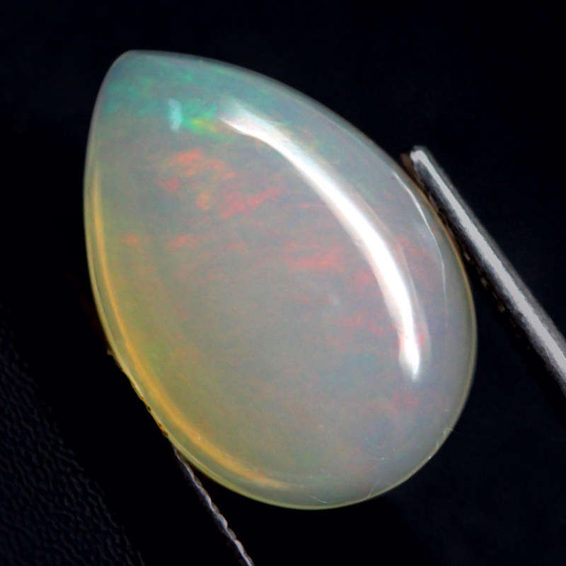 2.06Ct.  Opal Pear Cabochon Multi Colors Glittering Rainbow 3D Ethiopian Gemstone