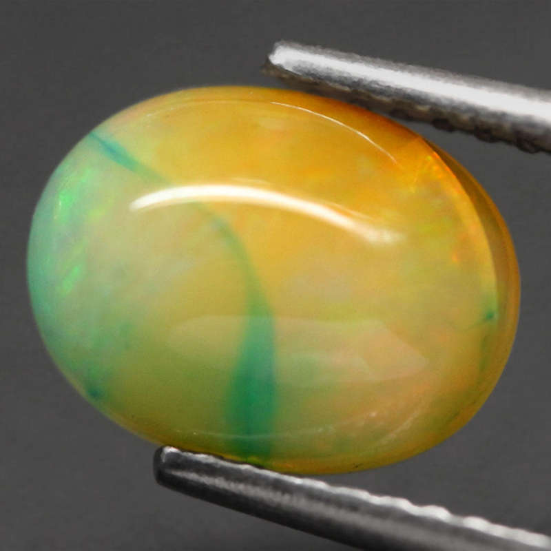 1.36Ct.  Opal Oval Cabochon Multi Colors Glittering Rainbow 3D Ethiopian Gemstone