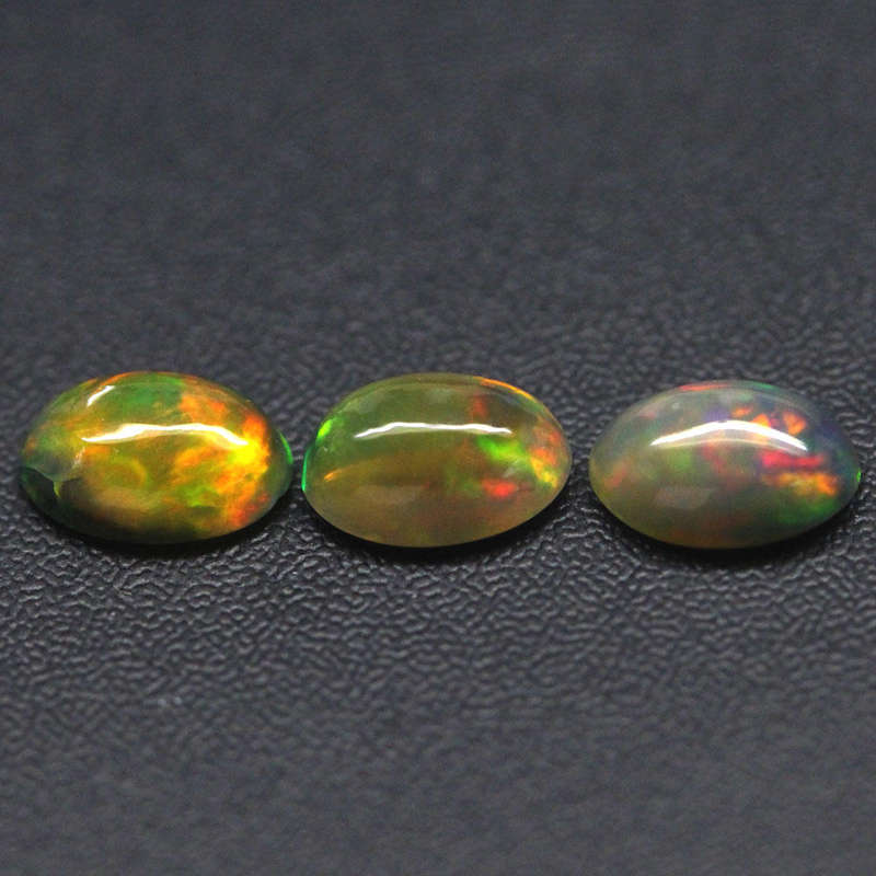 0.97Ct.  Opal Oval Cabochon 3 Pieces Multi Colors Glittering Rainbow 3D Ethiopian