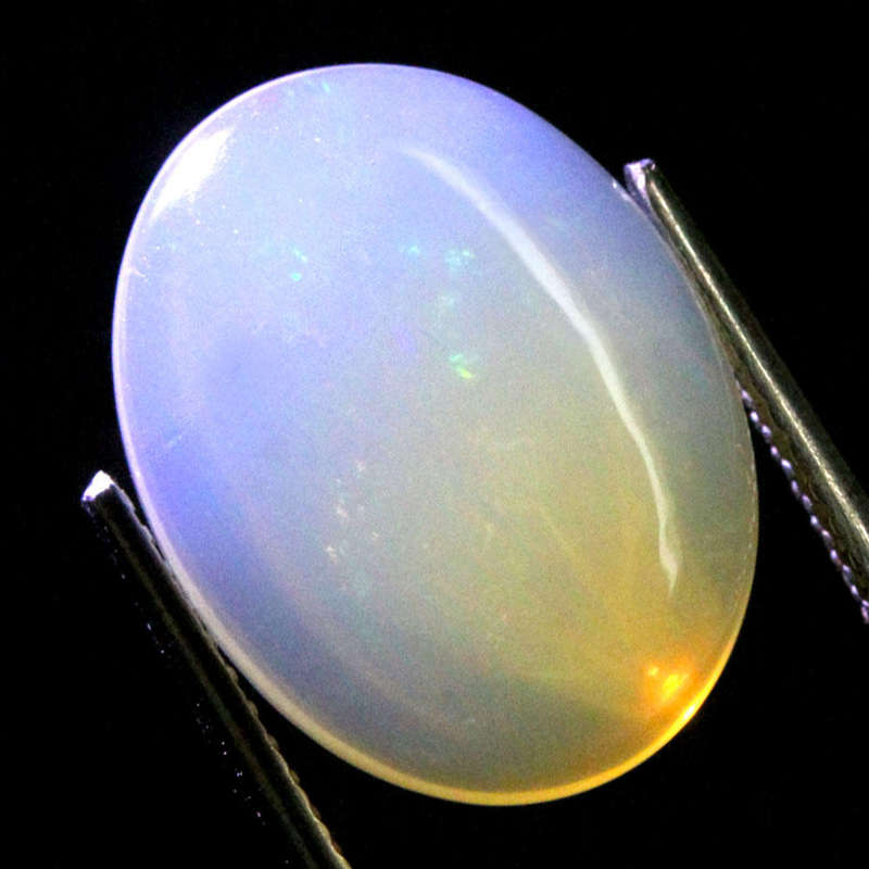 4.22Ct.  Opal Oval Cabochon Multi Colors Glittering Rainbow 3D Ethiopian