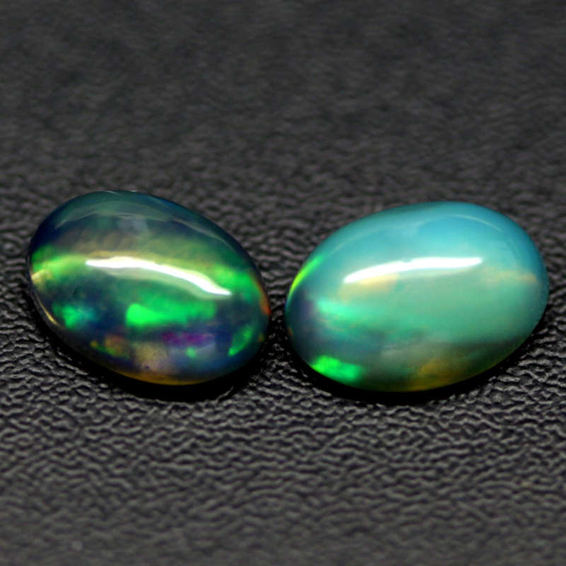 1.25Ct.  Opal Oval Cabochon Multi Colors Glittering Rainbow 3D Ethiopian