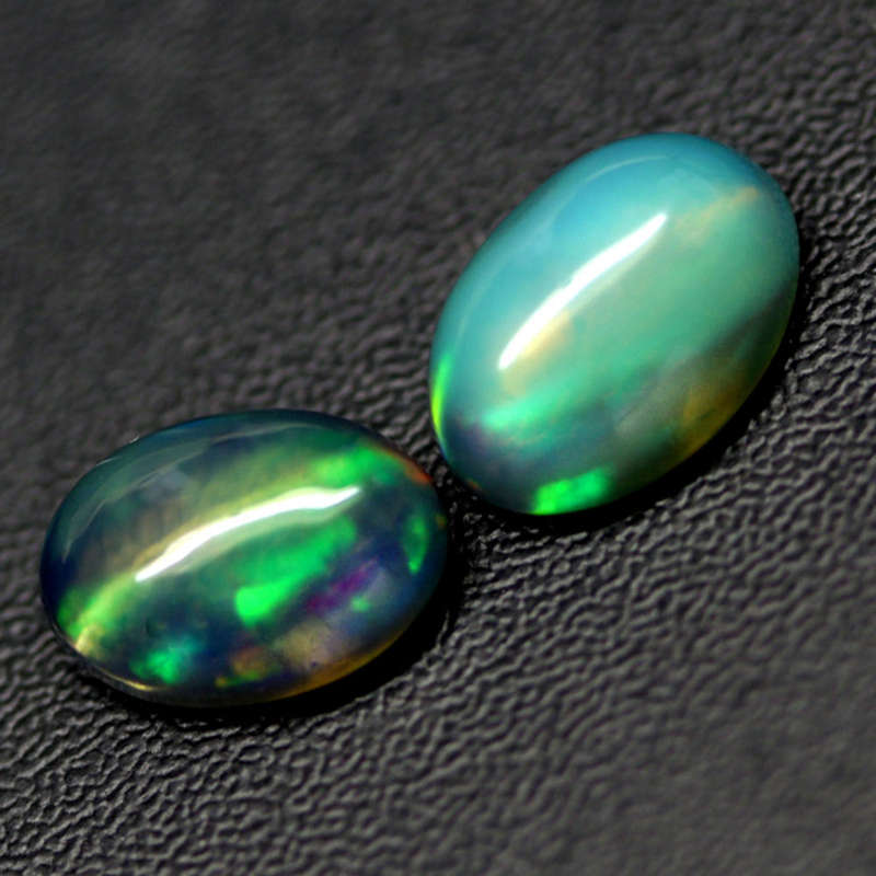 1.25Ct.  Opal Oval Cabochon Multi Colors Glittering Rainbow 3D Ethiopian