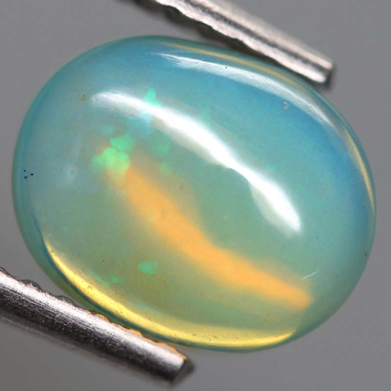 1.12Ct. Opal Oval Cabochon Multi Colors Glittering Rainbow 3D Ethiopian Gemstone