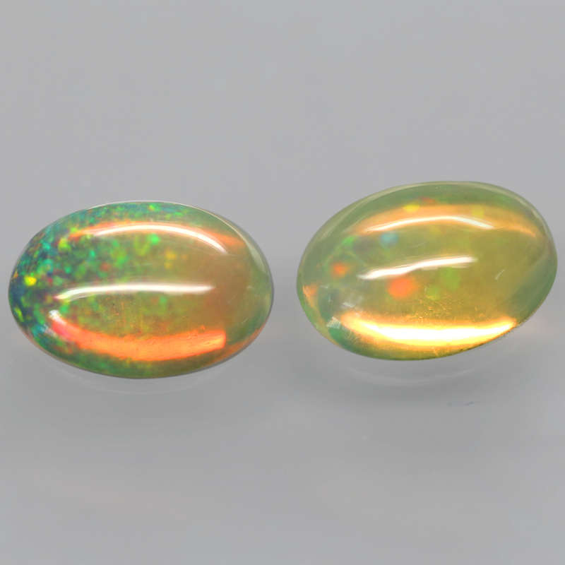 0.96Ct.  Opal Oval **Pair**Cabochon Multi Colors Glittering Rainbow 3D Ethiopian Gemstone