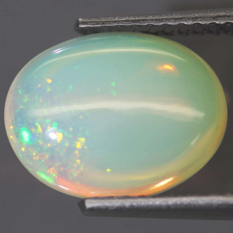 2.18Ct. Opal Oval Cabochon Multi Colors Glittering Rainbow 3D Ethiopian