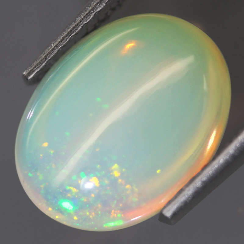 2.18Ct. Opal Oval Cabochon Multi Colors Glittering Rainbow 3D Ethiopian