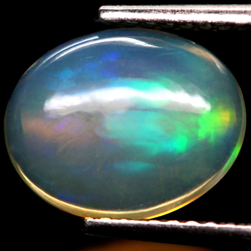 1.57Ct.  Opal Oval Cabochon Multi Colors Glittering Rainbow 3D Ethiopian Gemstone