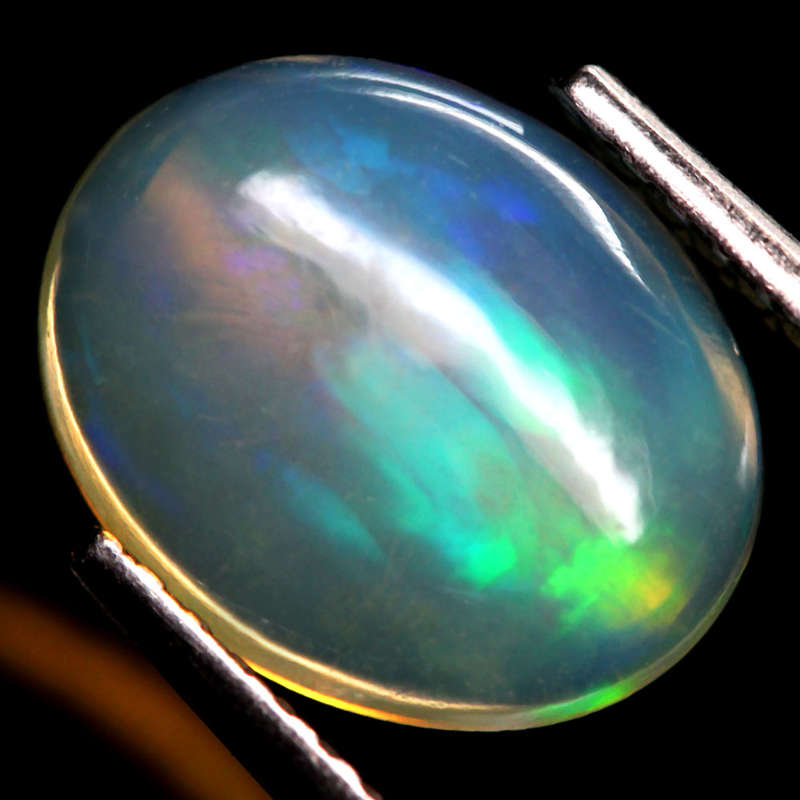 1.57Ct.  Opal Oval Cabochon Multi Colors Glittering Rainbow 3D Ethiopian Gemstone