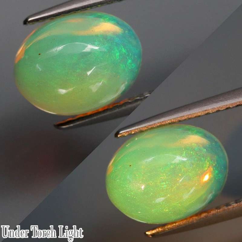 2.29Ct.Opal Oval Cab. Yellow & Rainbow Color Sparkling  Ethiopia