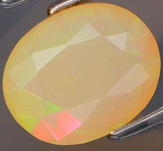 1.53Ct. Opal Fecetted Oval  Yellow & Rainbow Color Sparkling  Ethiopia Natural