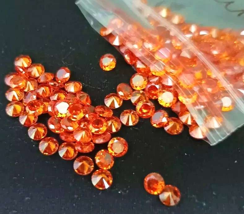 Sapphire Round 0.23Cts Diamond Cut 3.5mm .Orangish Yellow Beautiful & Full Fire
