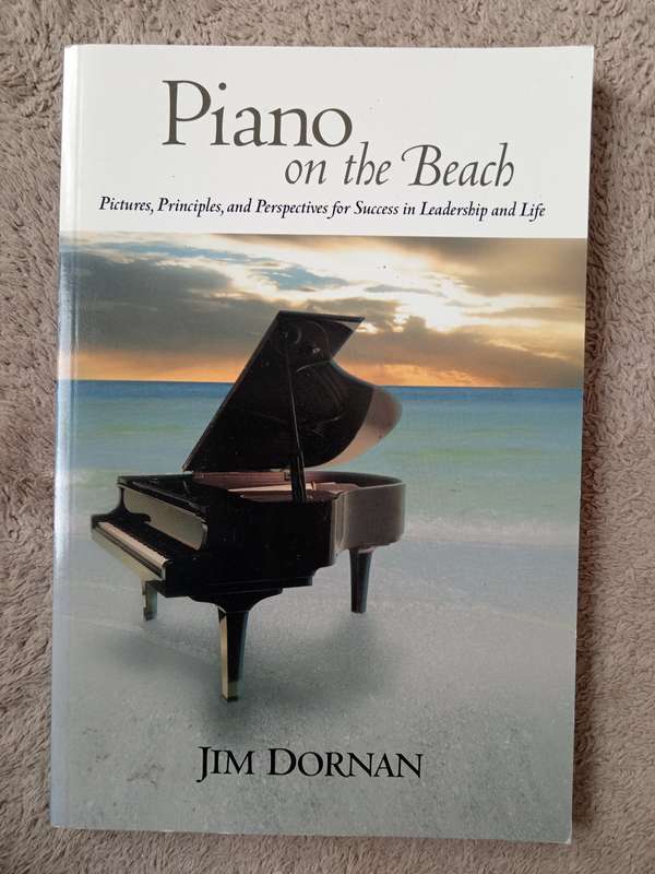 Piano on the Beach by Jim Dorman