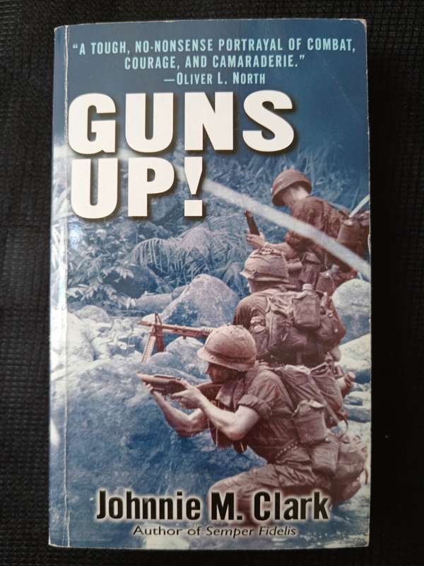 Guns Up! by Johnnie M Clark