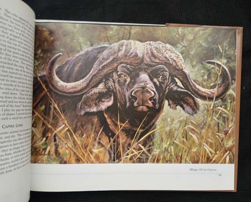 An African Lion as Man-Eater by Guy Coheleach Forward by Jack Nicklaus