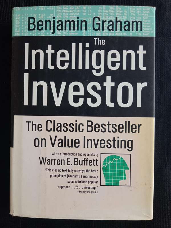 The Intelligent Investor by Benjamin Graham with an Introduction & Appendix by Warren E Buffett
