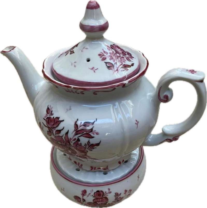 Vintage porcelain floral teapot with warmer stövchen