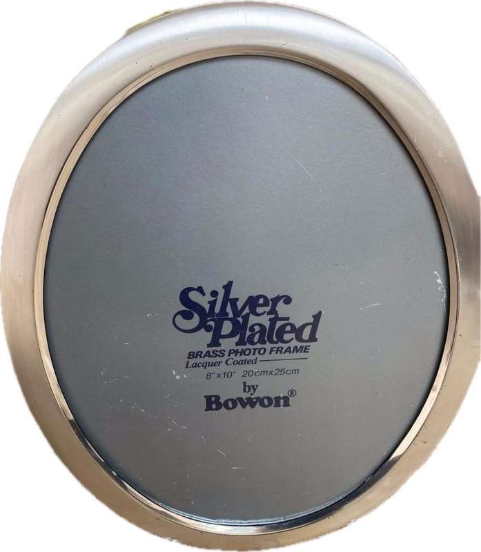 Oval silver plated picture frame by Bowon with small brass frame