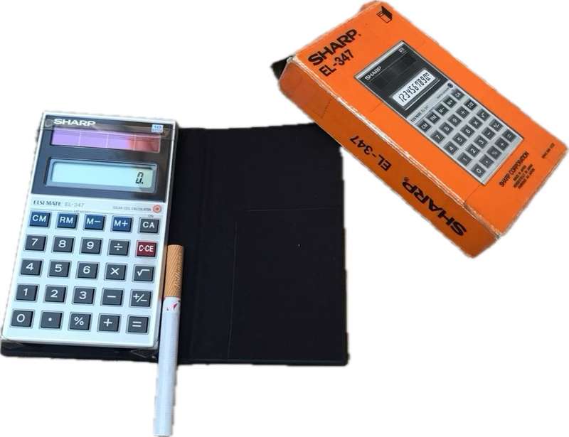 Vintage sharp EL - 347 solar cell calculator