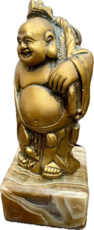 Buddha figure on petrified wood base pedestal