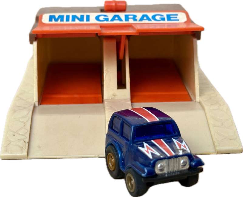 Vintage road champs mini garage with Golden eagle car
