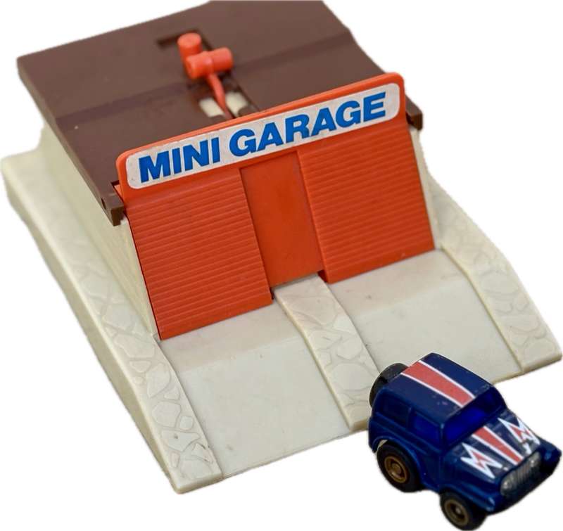 Vintage road champs mini garage with Golden eagle car