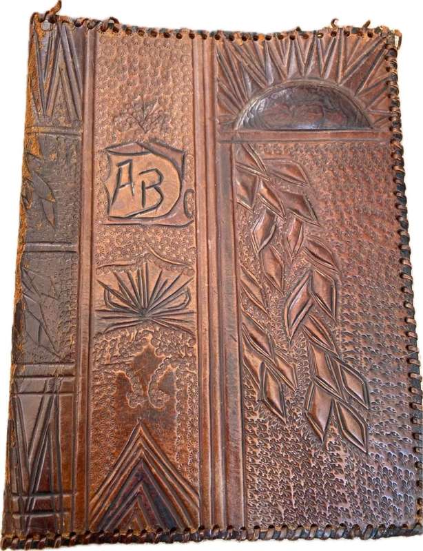 Vintage leather journal cover with prescription notes and envelopes