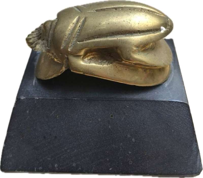 vintage brass scarab on base