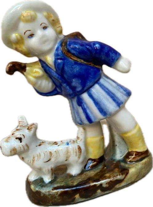 Vintage ceramic porcelain figurine pair , child with dog and soldier