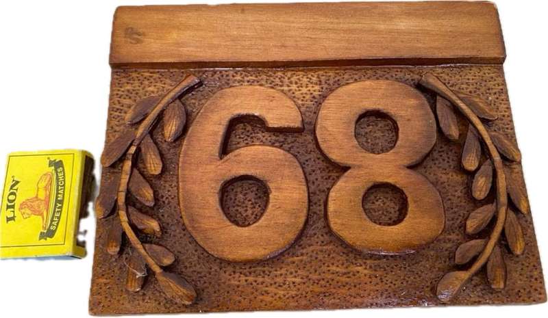 No 89 , no 68 wood carved no plaque