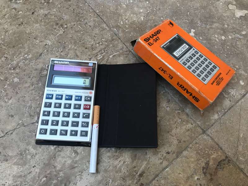 Vintage sharp EL - 347 solar cell calculator