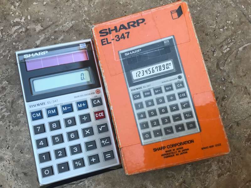 Vintage sharp EL - 347 solar cell calculator