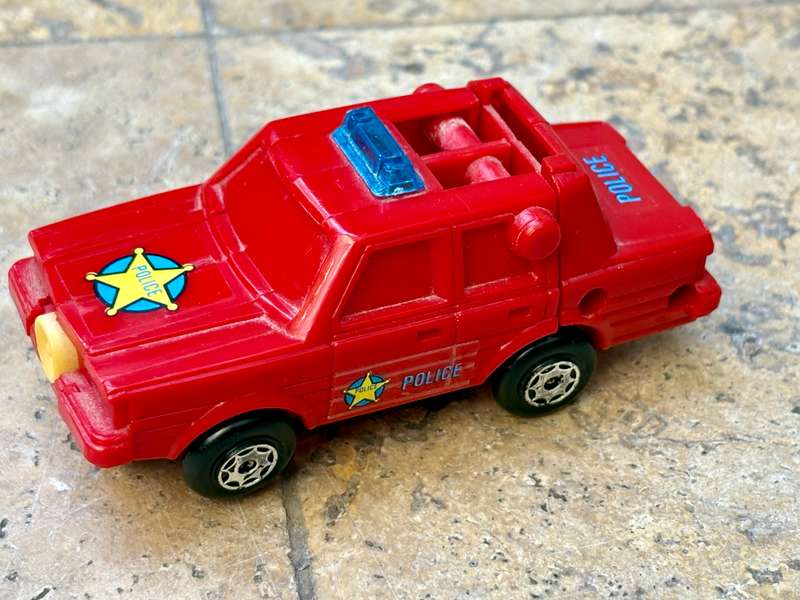 Vintage esso robot racer transforming police car pvc Hong Kong  1984