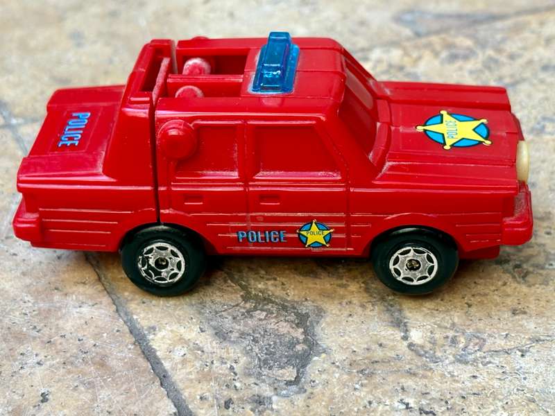 Vintage esso robot racer transforming police car pvc Hong Kong  1984
